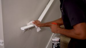 Disinfecting stair rail